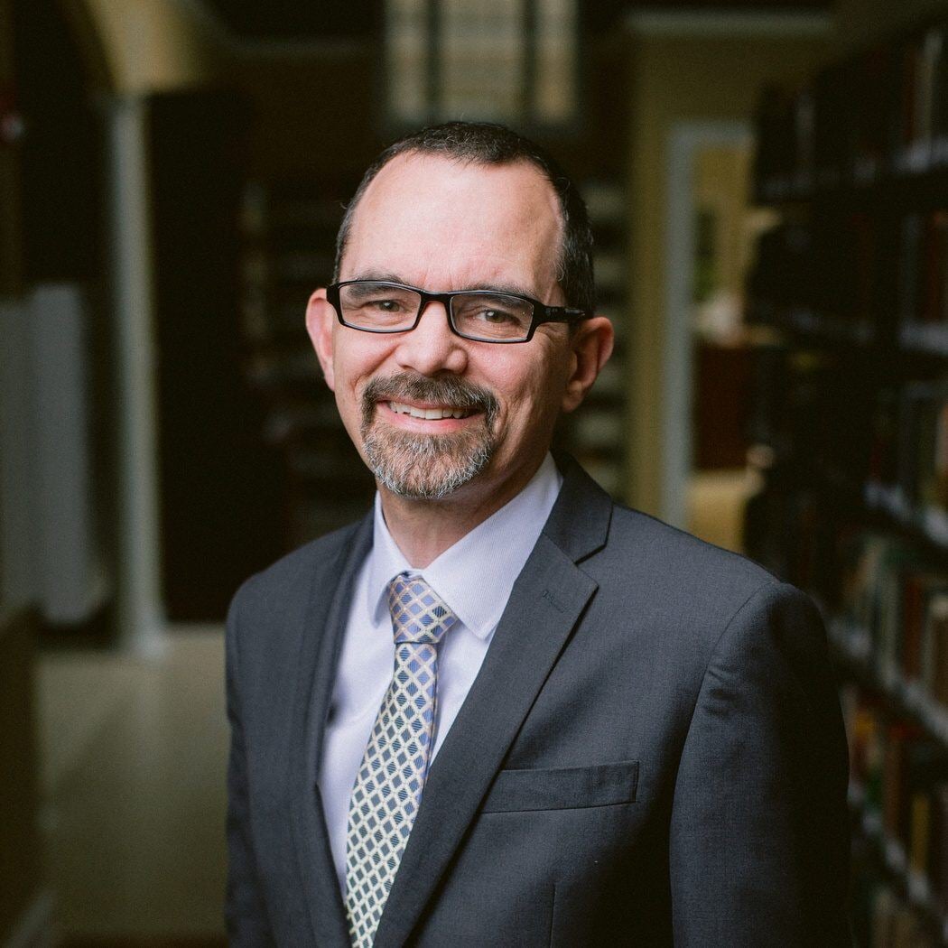 Dr. Bruce A.